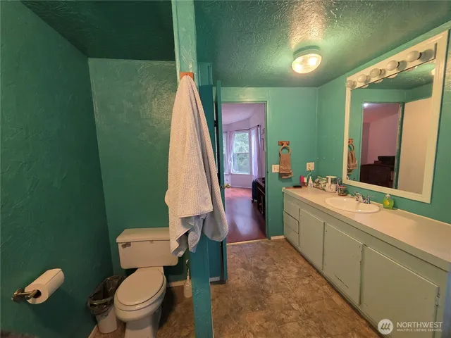 a room with furniture and a fireplace