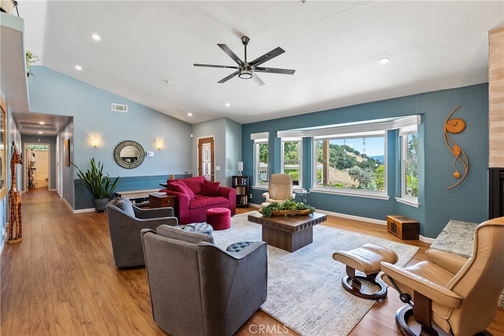 7215 San Gabriel Road Atascadero, CA 93422 - Photo 11 of 74 a living room with furniture and a large window