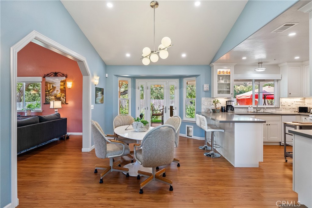7215 San Gabriel Road Atascadero, CA 93422 - Photo 18 of 74 a view of a dining room with furniture window and wooden floor