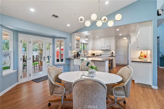 a living room with furniture rug and window