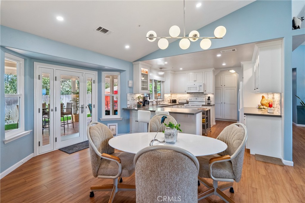 7215 San Gabriel Road Atascadero, CA 93422 - Photo 19 of 74 a view of a dining room with furniture window and wooden floor