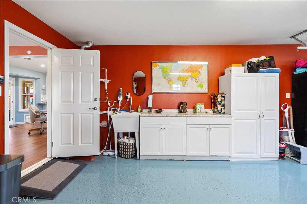 7215 San Gabriel Road Atascadero, CA 93422 - Photo 27 of 74 Sink, cabinets and countertop space make this a flexible space.