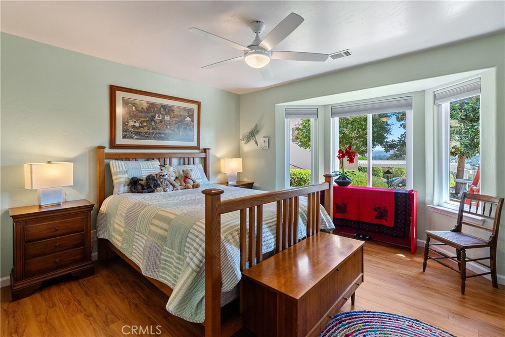 7215 San Gabriel Road Atascadero, CA 93422 - Photo 31 of 74 Bedroom 3 also has a awesome bay window to bring in the views and vinyl plank flooring.