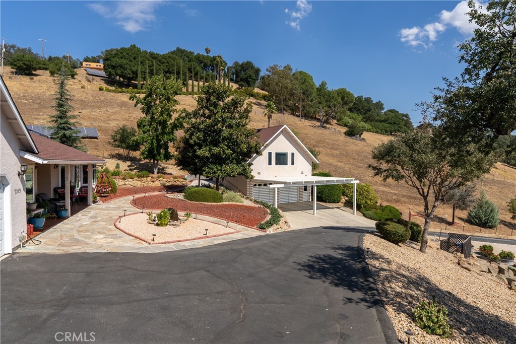 7215 San Gabriel Road Atascadero, CA 93422 - Photo 39 of 74 a front view of a house with a yard