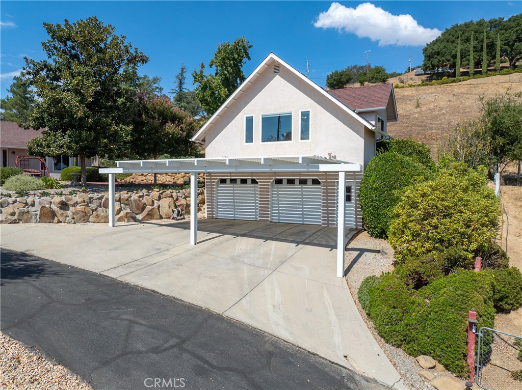 7215 San Gabriel Road Atascadero, CA 93422 - Photo 40 of 74 a view of house with outdoor space and garden