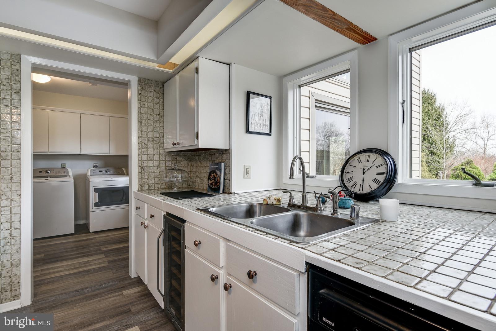 12928 Coppermine Road Union Bridge, MD 21791 - Photo 15 of 38 a kitchen with appliances cabinets and a sink