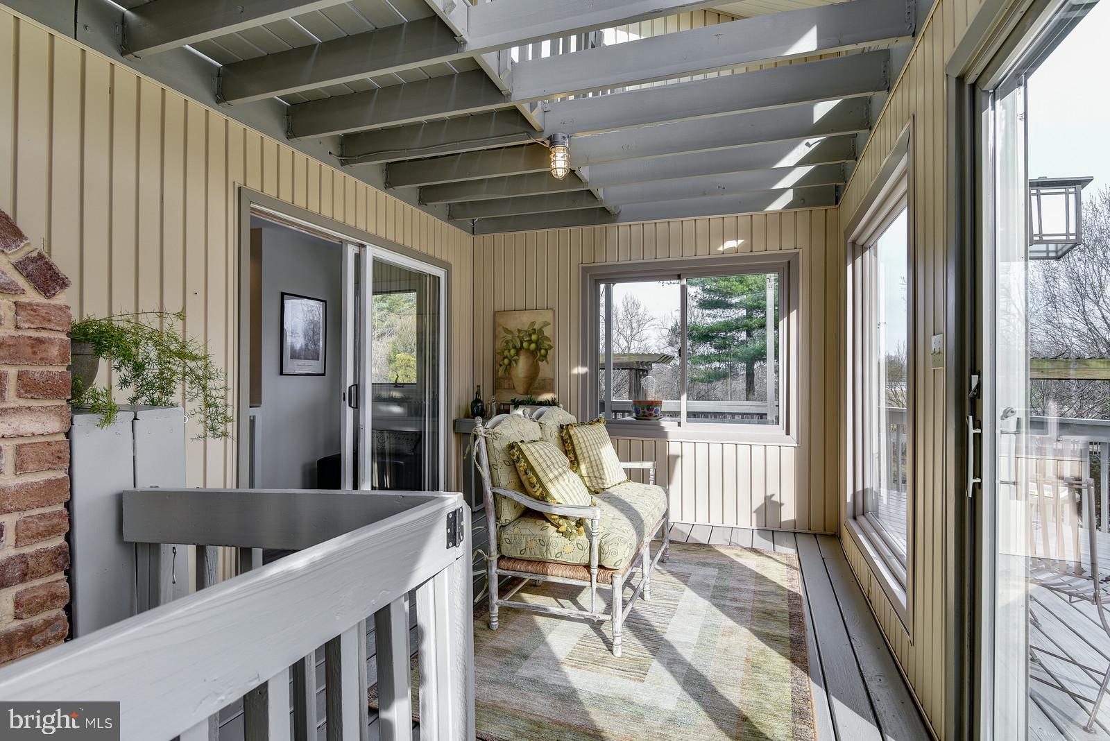 12928 Coppermine Road Union Bridge, MD 21791 - Photo 22 of 38 a view of a living room and a porch