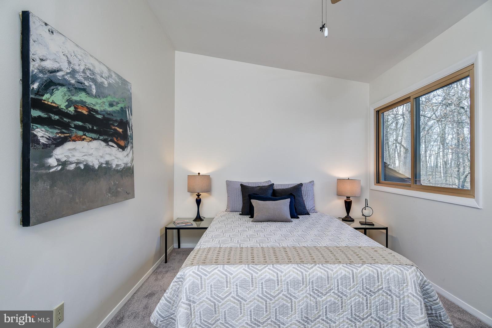 12928 Coppermine Road Union Bridge, MD 21791 - Photo 27 of 38 a bedroom with a bed and a window