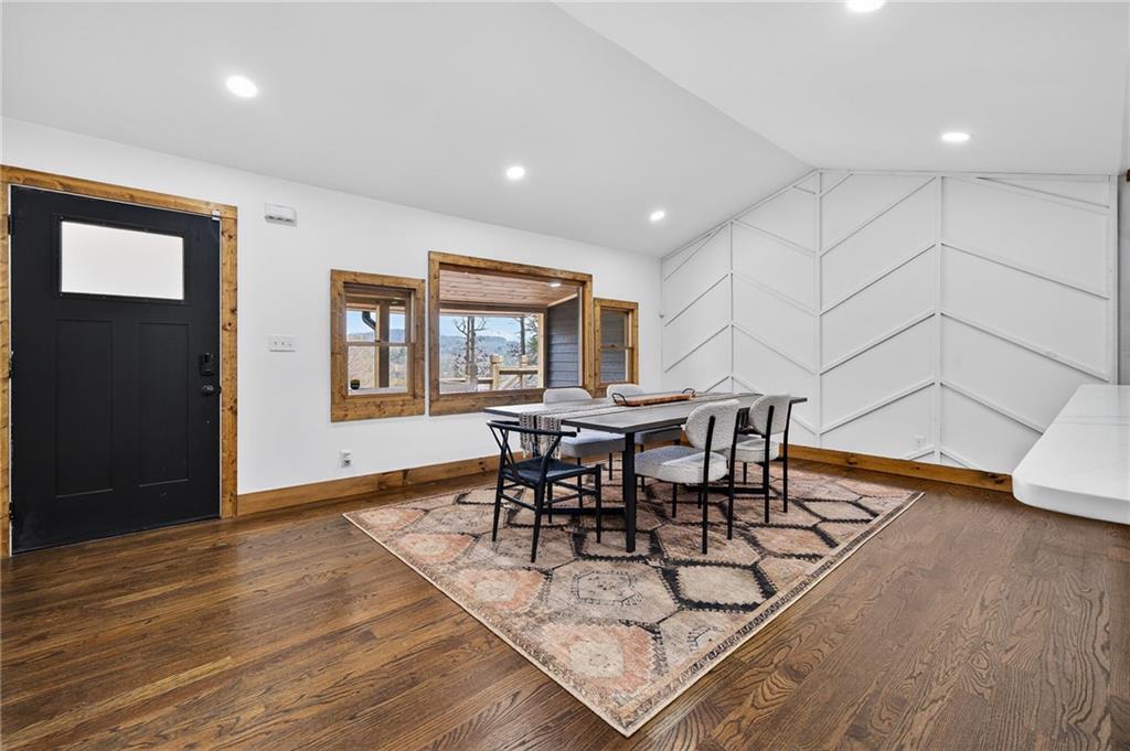 11 Collins Hollow Road Morganton, GA 30560 - Photo 16 of 55 a view of a dining room with furniture and wooden floor