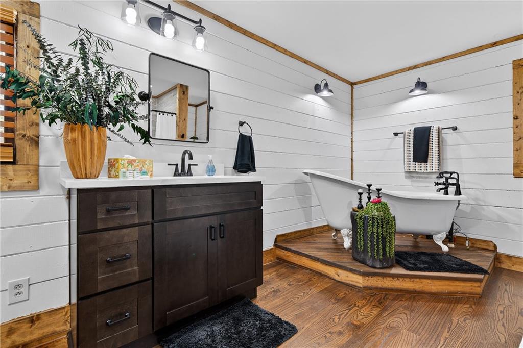 11 Collins Hollow Road Morganton, GA 30560 - Photo 32 of 55 a bathroom with a sink and a mirror
