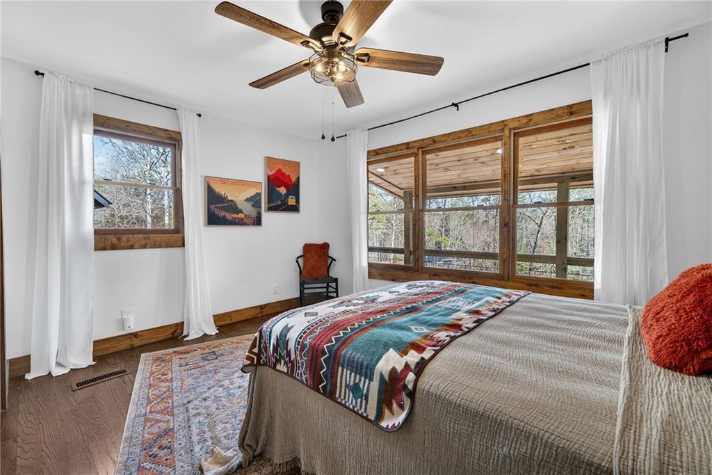11 Collins Hollow Road Morganton, GA 30560 - Photo 34 of 55 a bedroom with a large bed and a window