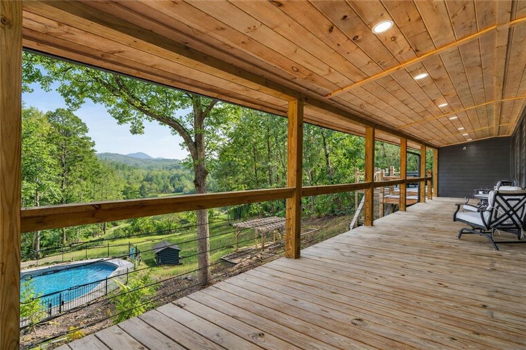 11 Collins Hollow Road Morganton, GA 30560 - Photo 4 of 55 a view of two chairs in the balcony
