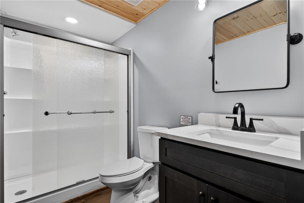 11 Collins Hollow Road Morganton, GA 30560 - Photo 43 of 55 a bathroom with a sink and a mirror
