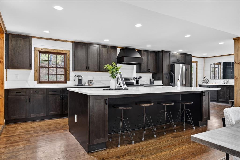 11 Collins Hollow Road Morganton, GA 30560 - Photo 8 of 55 a kitchen with stainless steel appliances granite countertop a sink counter space and cabinets