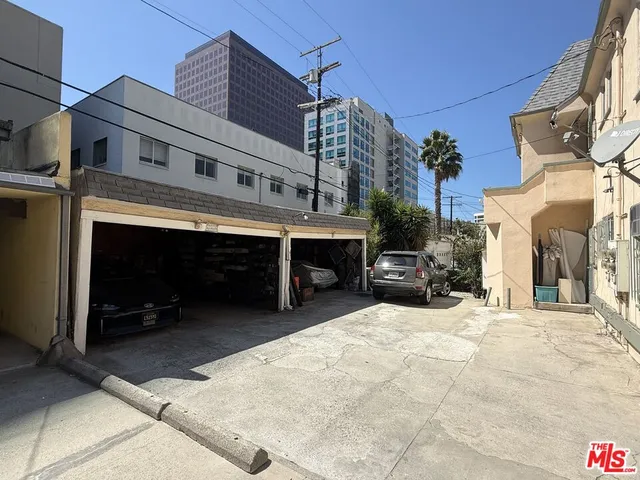 a view of a building with a fireplace and a table chair