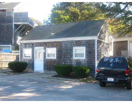 270 R Main Street Bourne, MA 02532 - Photo 1 of 1 a view of a car park in front of house