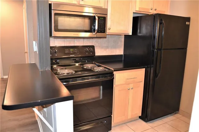 $1,150,000 | 4143-4157 Roanoke Road, Kansas City, MO 64111