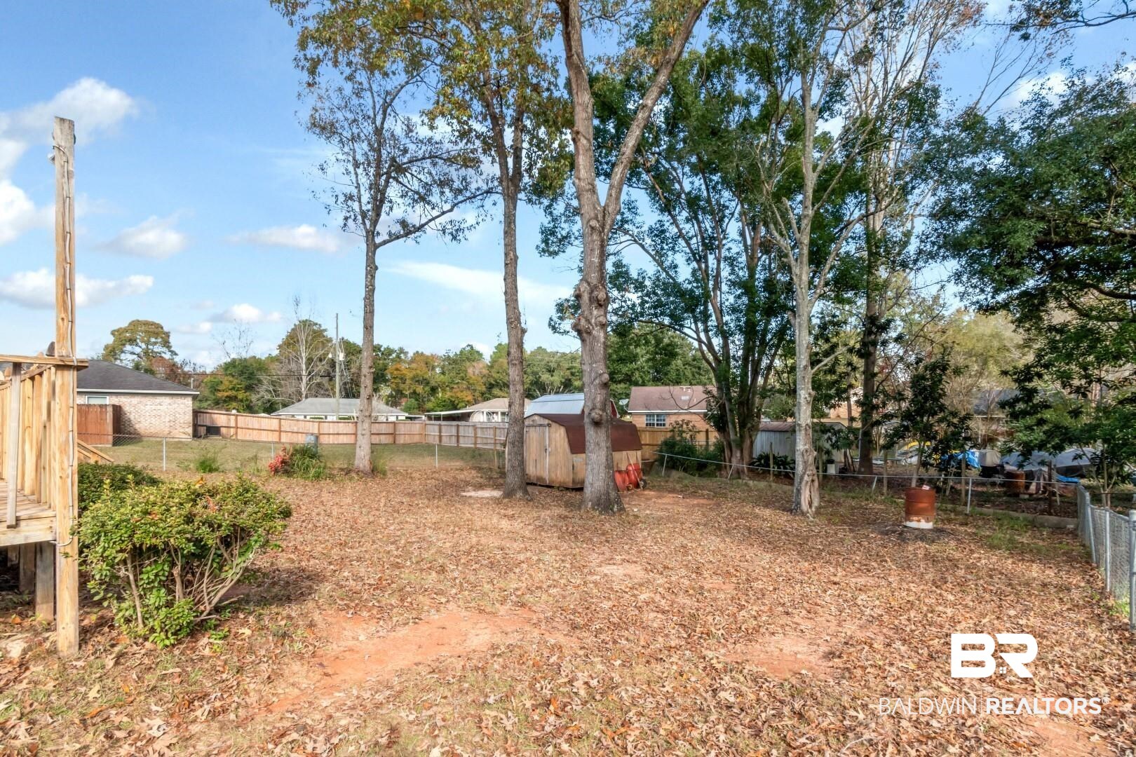 9360 Burnt Tree Drive Mobile, AL 36695 - Photo 24 of 28 View of yard featuring a storage shed