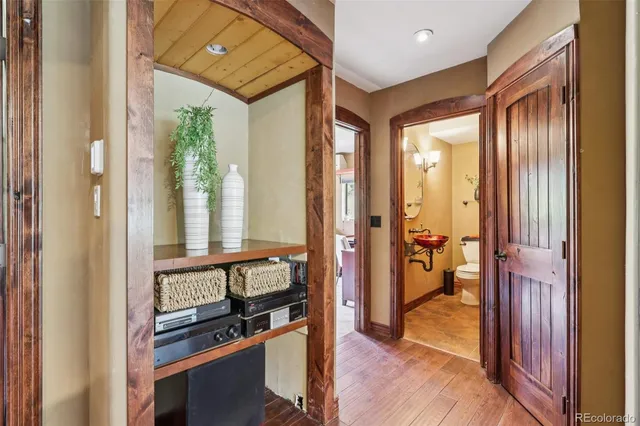 a bathroom with a sink a mirror and a shower