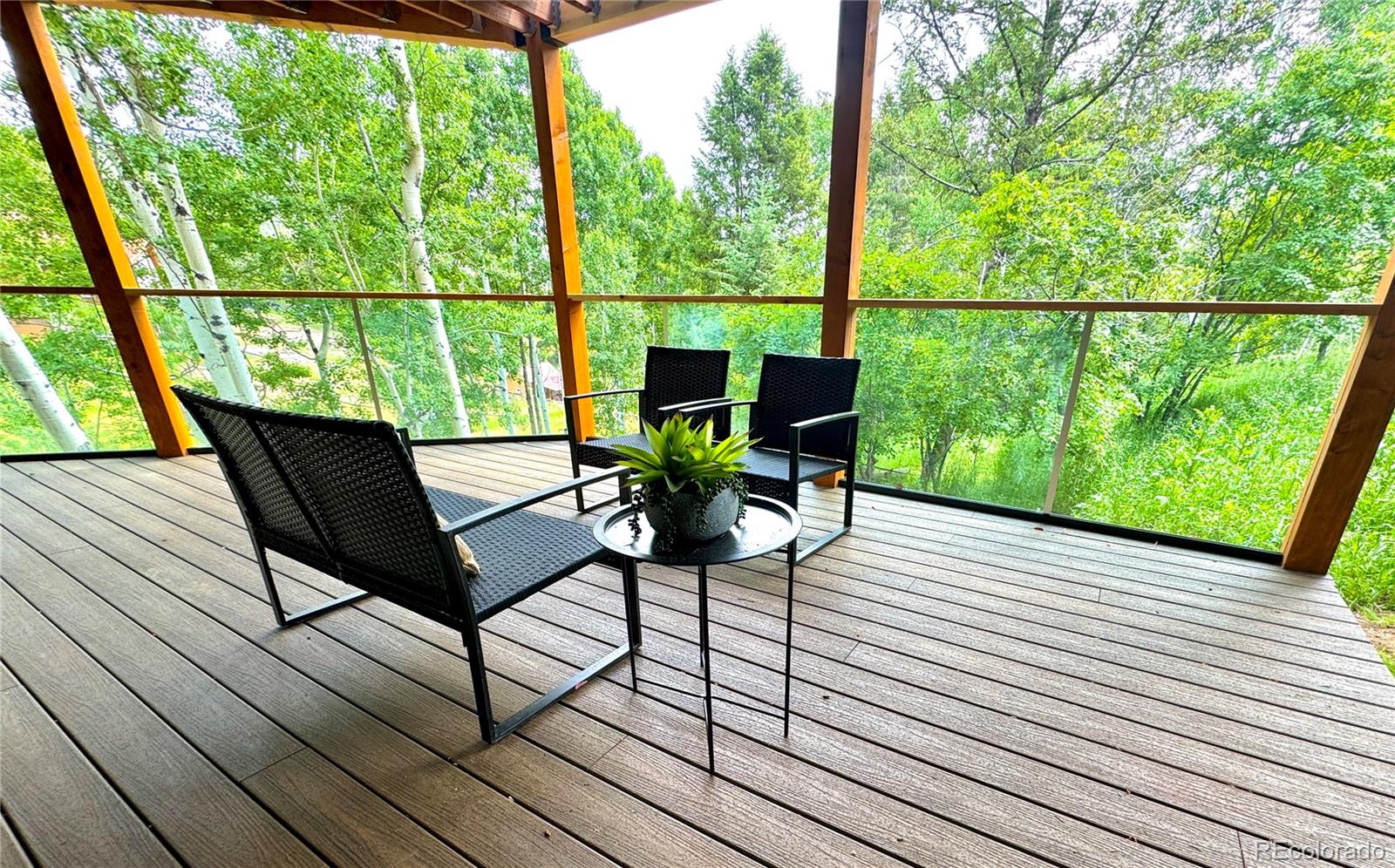 20033 Silver Ranch Road Conifer, CO 80433 - Photo 34 of 43 a view of a chairs on the roof deck