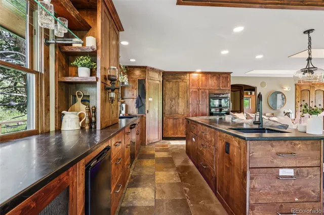 a view of a balcony with furniture
