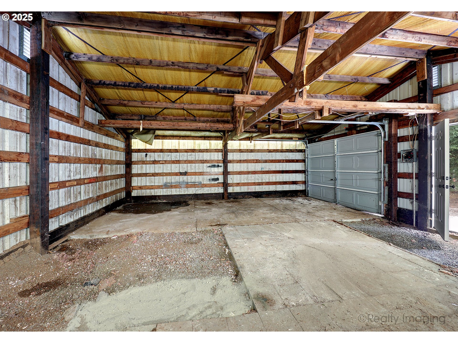 25581 South Holman Road Estacada, OR 97023 - Photo 11 of 14 a view of a room with racks on the wall