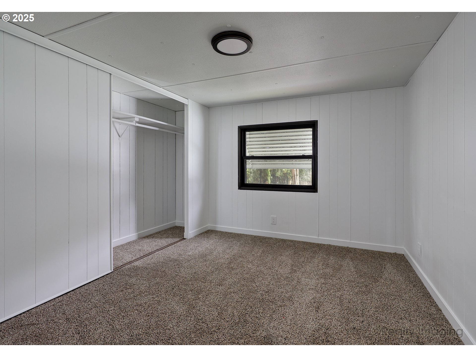 25581 South Holman Road Estacada, OR 97023 - Photo 7 of 14 an empty room with windows and closet