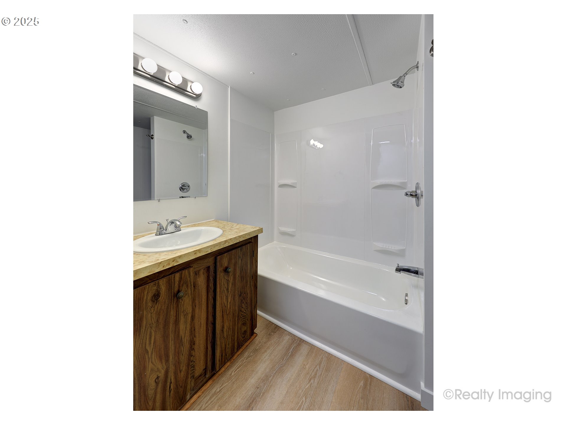 25581 South Holman Road Estacada, OR 97023 - Photo 8 of 14 a bathroom with a sink and a bathtub