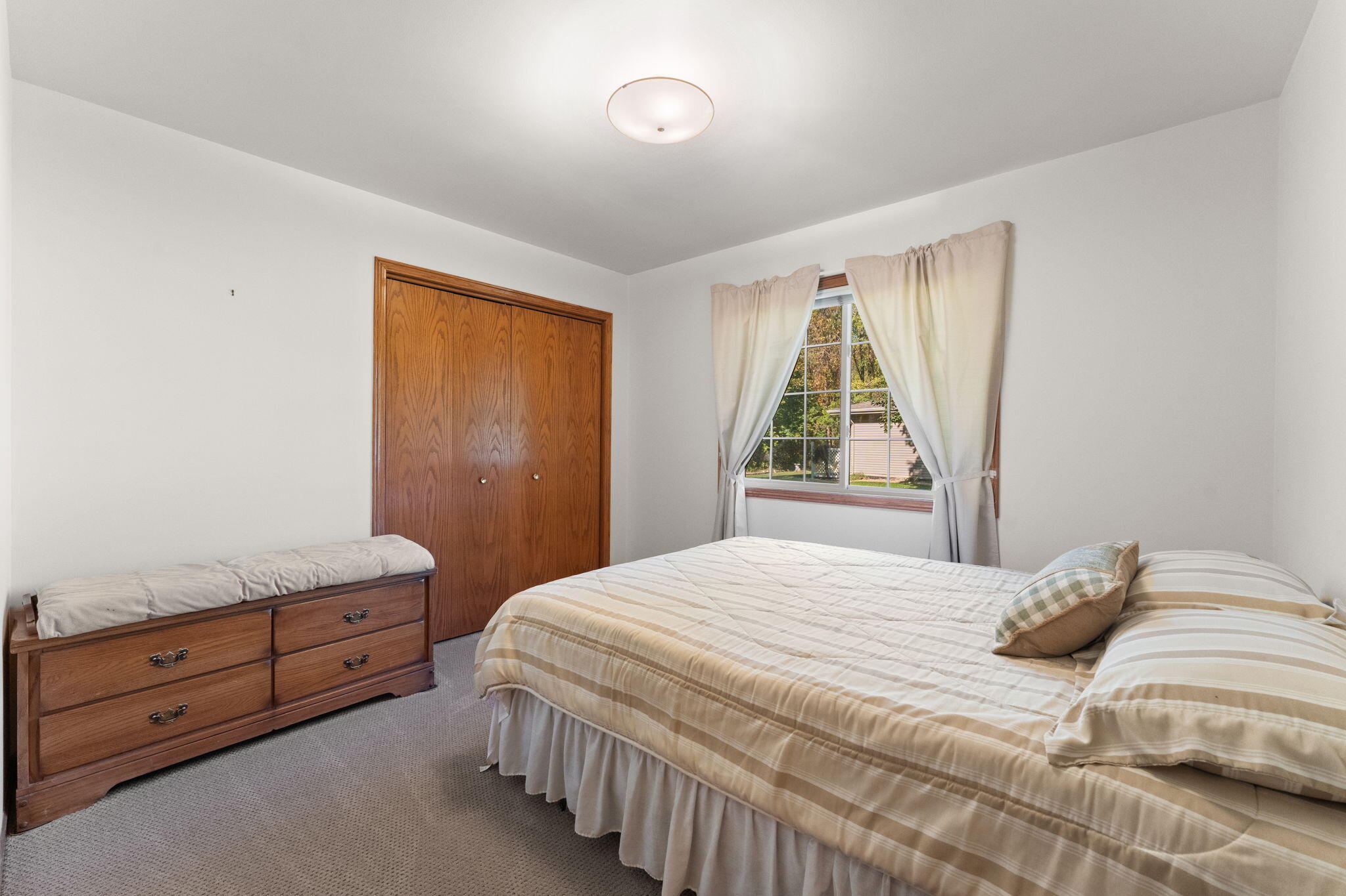 2034 Texas Street Chesterton, IN 46304 - Photo 13 of 22 a bedroom with a bed and a window
