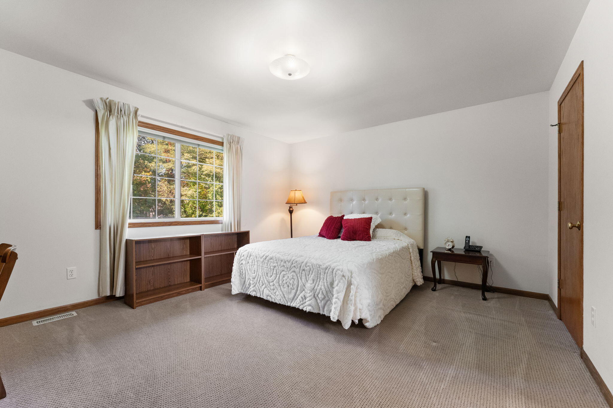 2034 Texas Street Chesterton, IN 46304 - Photo 14 of 22 a bedroom with a bed and a window