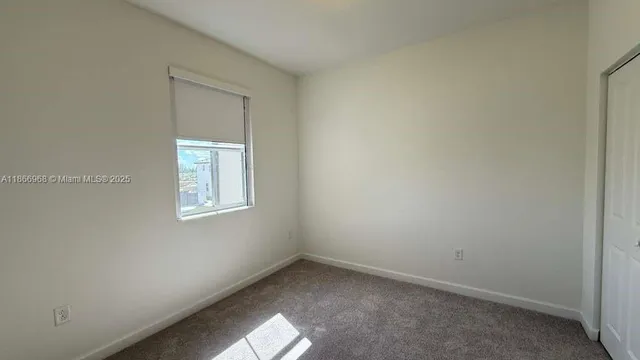 a bathroom with a bathtub and a toilet