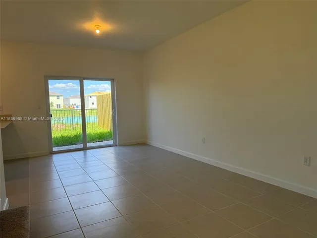 a view of hallway with stairs