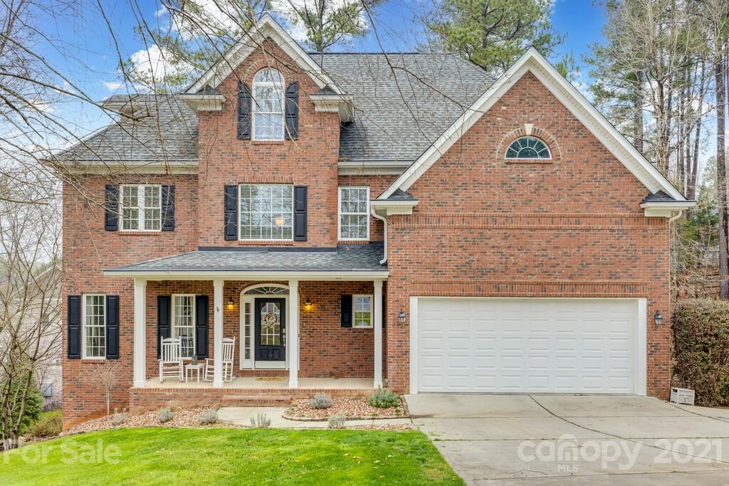 11155 Turtle Bay Court Tega Cay, SC 29708 - Photo 1 of 36 front view of a house with a yard