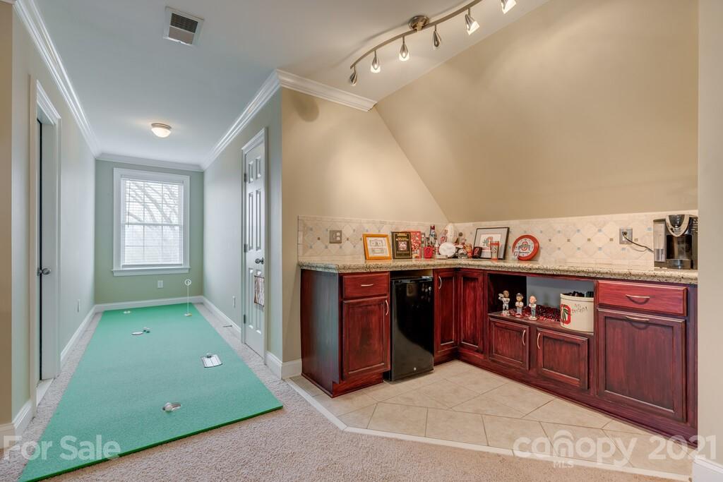 11155 Turtle Bay Court Tega Cay, SC 29708 - Photo 21 of 36 a view of a kitchen with furniture and window