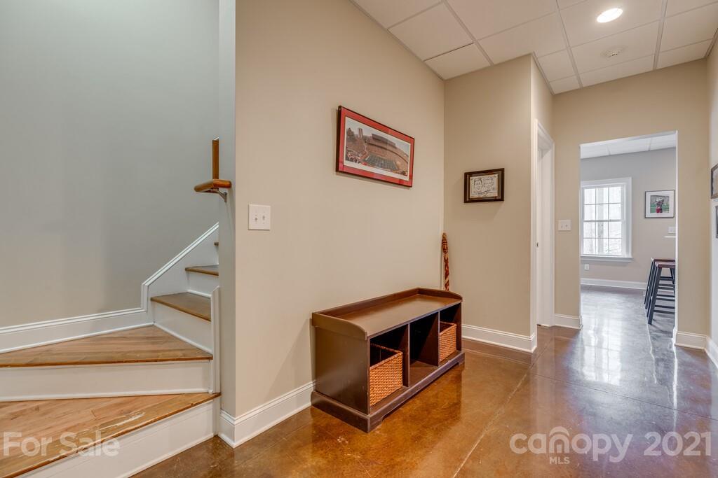 11155 Turtle Bay Court Tega Cay, SC 29708 - Photo 24 of 36 a living room with furniture and a wooden floor