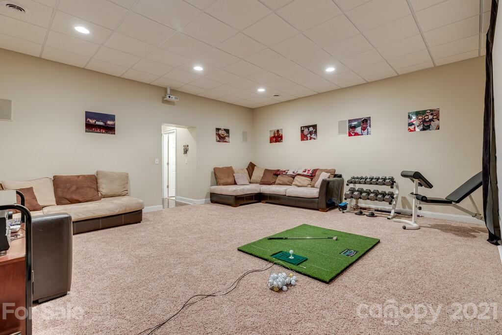 11155 Turtle Bay Court Tega Cay, SC 29708 - Photo 26 of 36 a living room with furniture and a rug