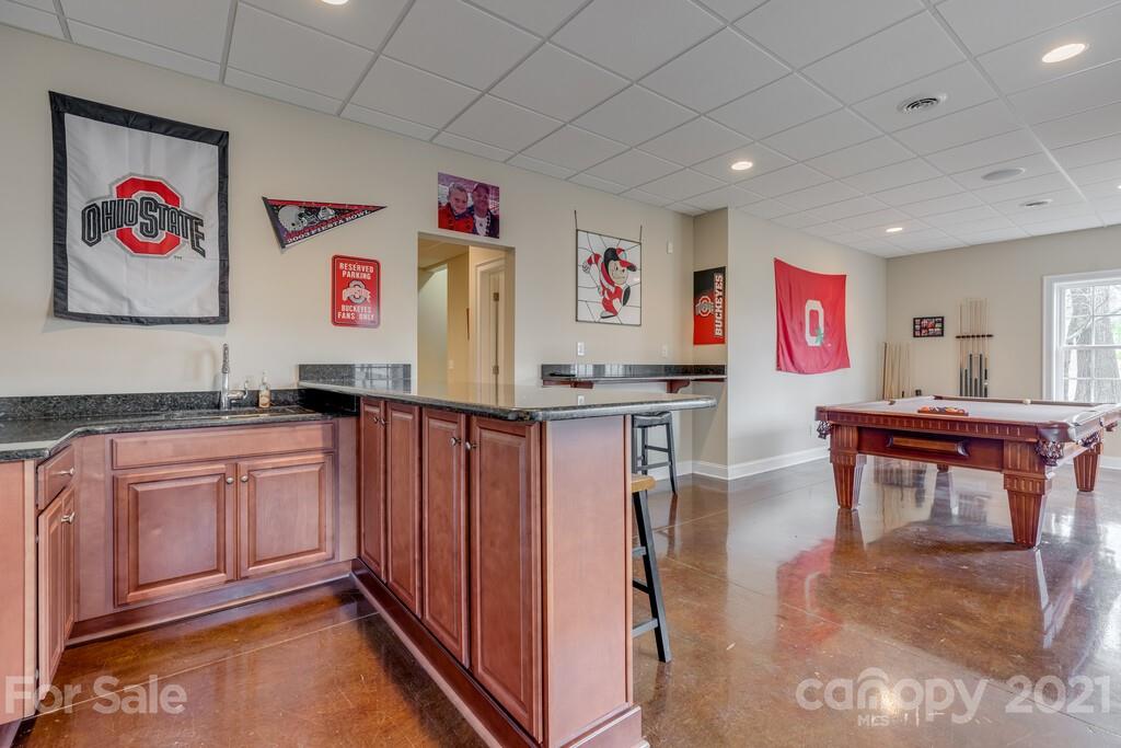 11155 Turtle Bay Court Tega Cay, SC 29708 - Photo 28 of 36 a hall with many appliances and cabinets