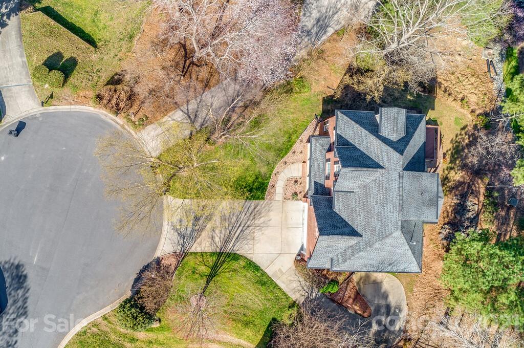 11155 Turtle Bay Court Tega Cay, SC 29708 - Photo 32 of 36 an aerial view of a house with a yard