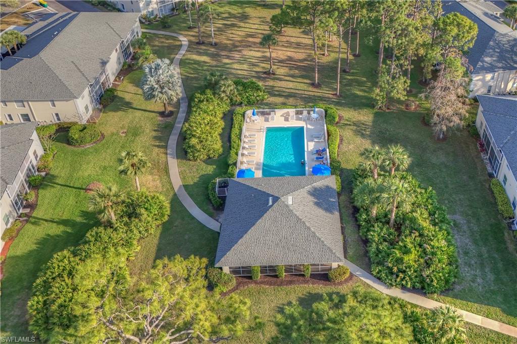 784 Landover Circle, Unit 203 Naples, FL 34104 - Photo 13 of 16 an aerial view of a house
