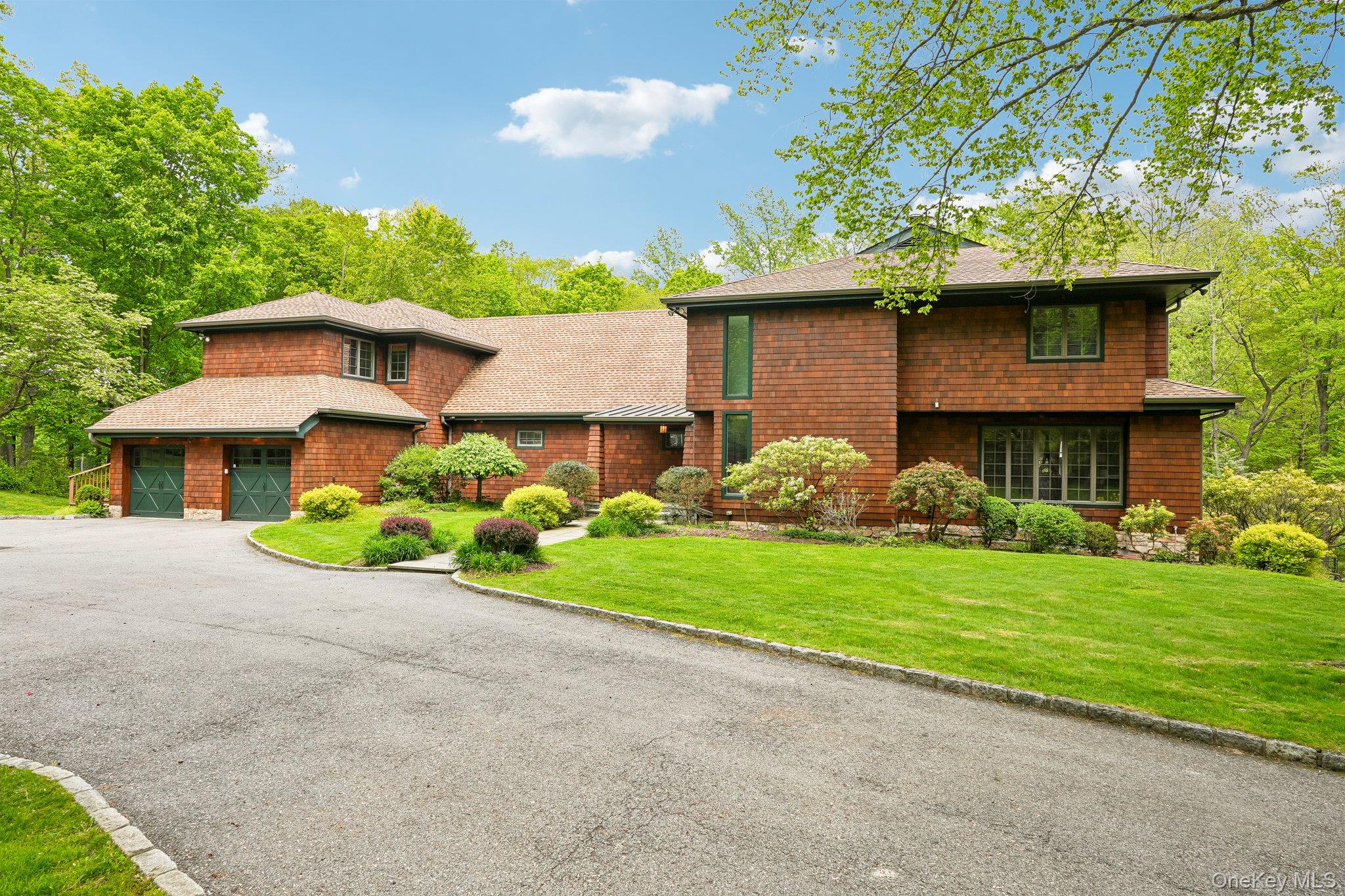 27 Cat Ridge Road North Salem, NY 10560 - Photo 5 of 49 a front view of a house with garden