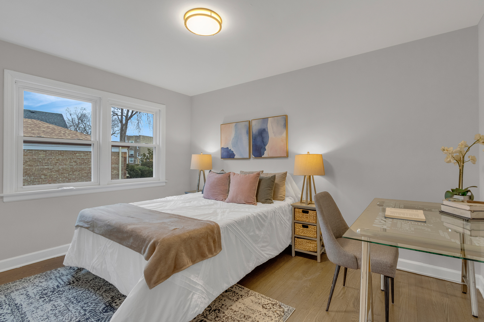 6304 North Troy Street Chicago, IL 60659 - Photo 18 of 35 a bedroom with a bed and window