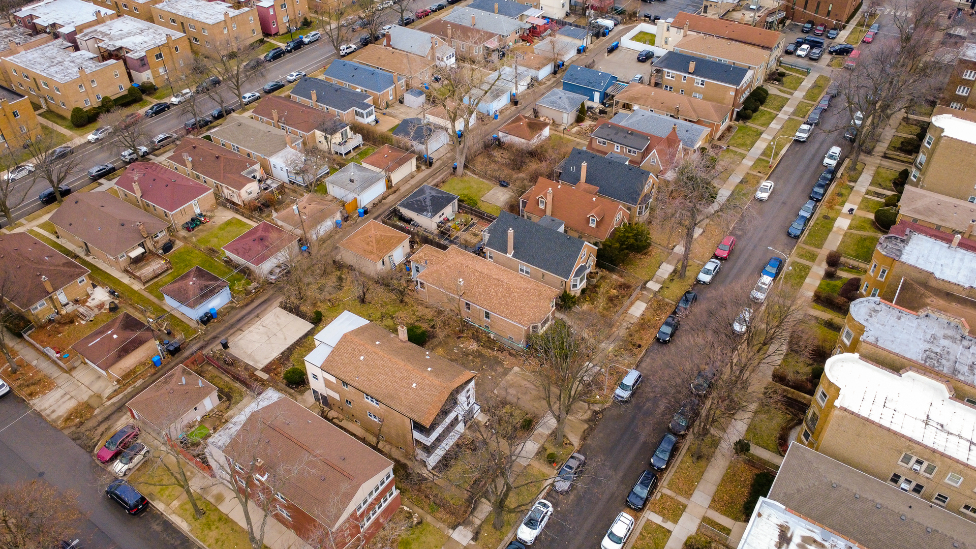 6304 North Troy Street Chicago, IL 60659 - Photo 35 of 35 an aerial view of a building with a yard