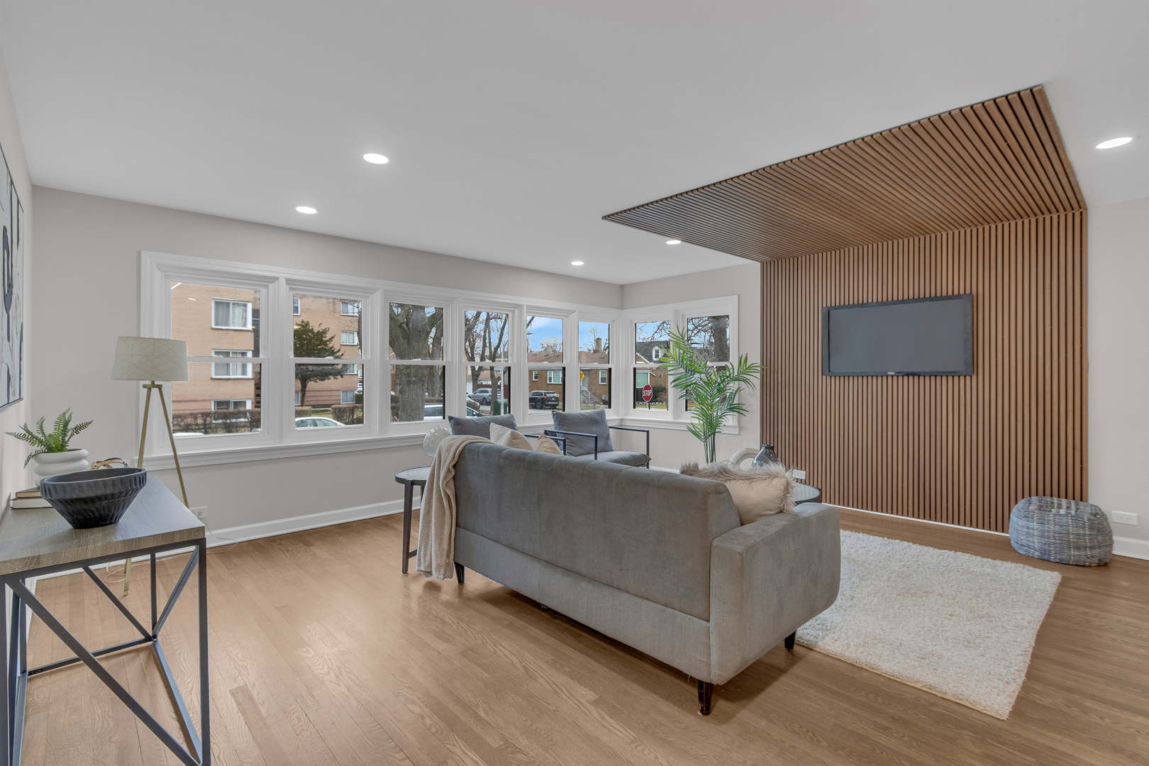 6304 North Troy Street Chicago, IL 60659 - Photo 4 of 35 a living room with furniture and a large window