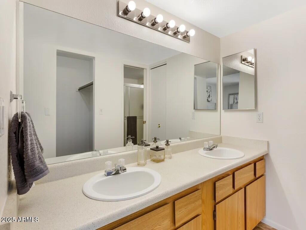 164 North 74th Street, Unit 2D Mesa, AZ 85207 - Photo 8 of 15 a bathroom with a sink double vanity and a mirror