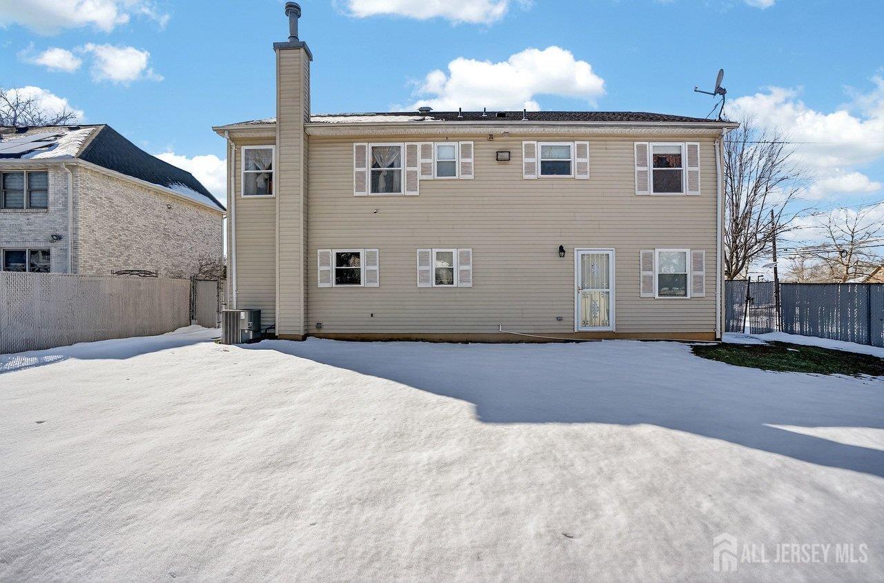 1 Wakefield Drive Edison, NJ 08820 - Photo 29 of 29 a front view of a house with a yard and garage