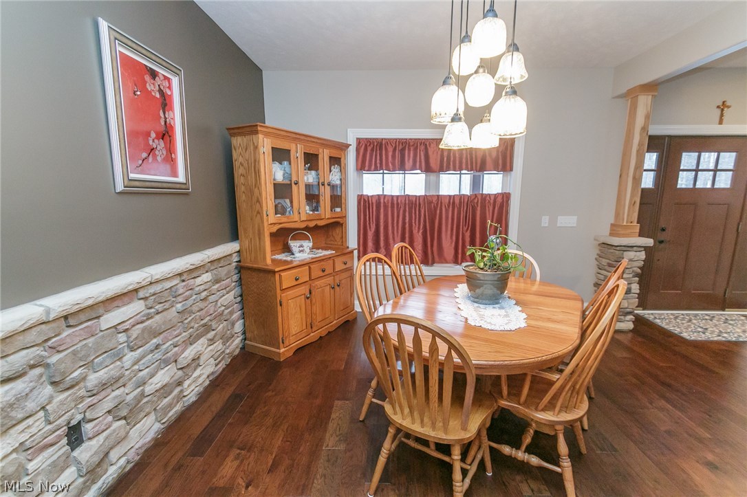 2499 Substation Road Medina, OH 44256 - Photo 13 of 35 Dining room with stone wall and pillars