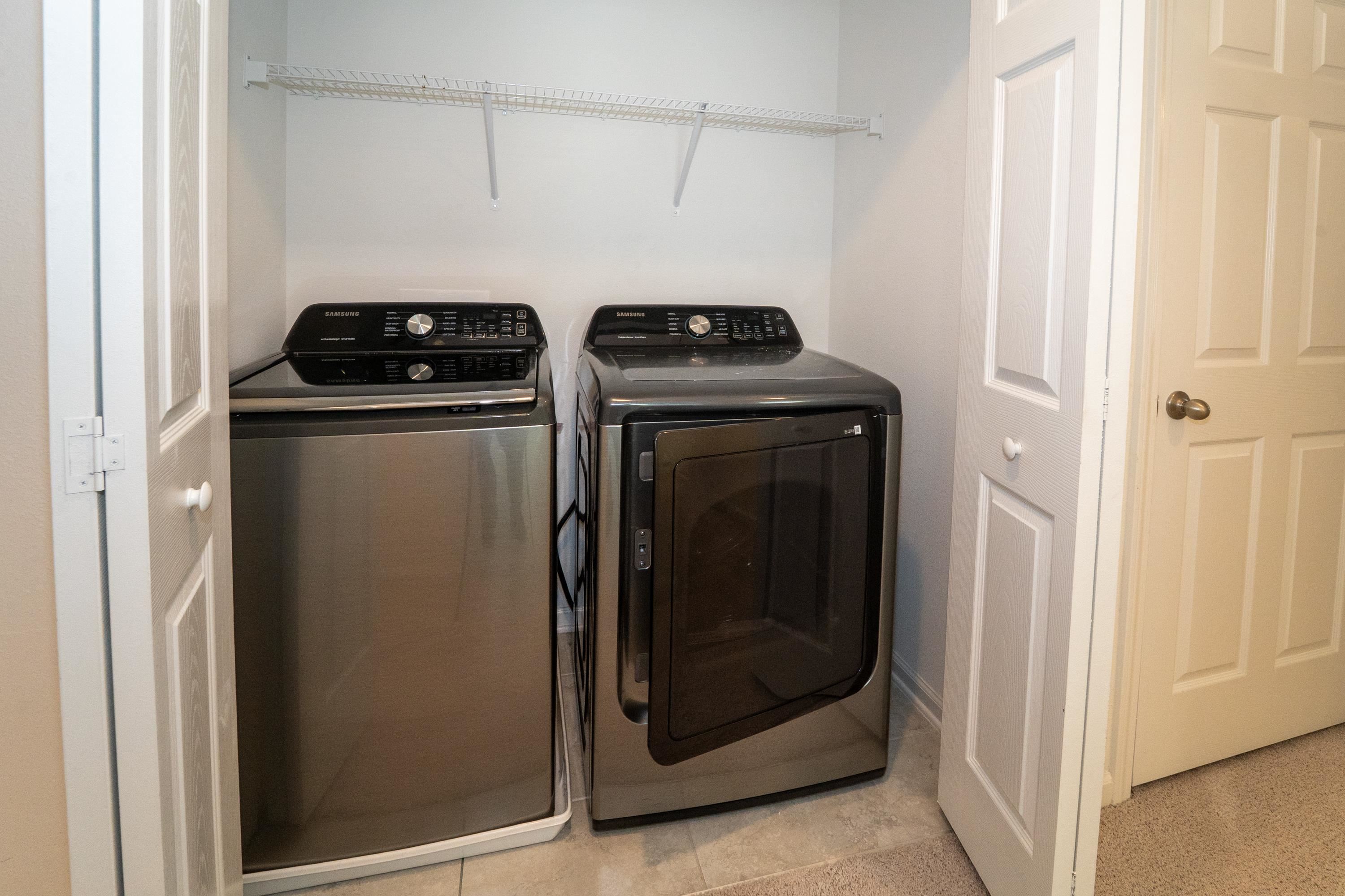 81 Ridge Lake Rd Street St. Augustine, FL 32086 - Photo 13 of 41 a utility room with dryer and washer