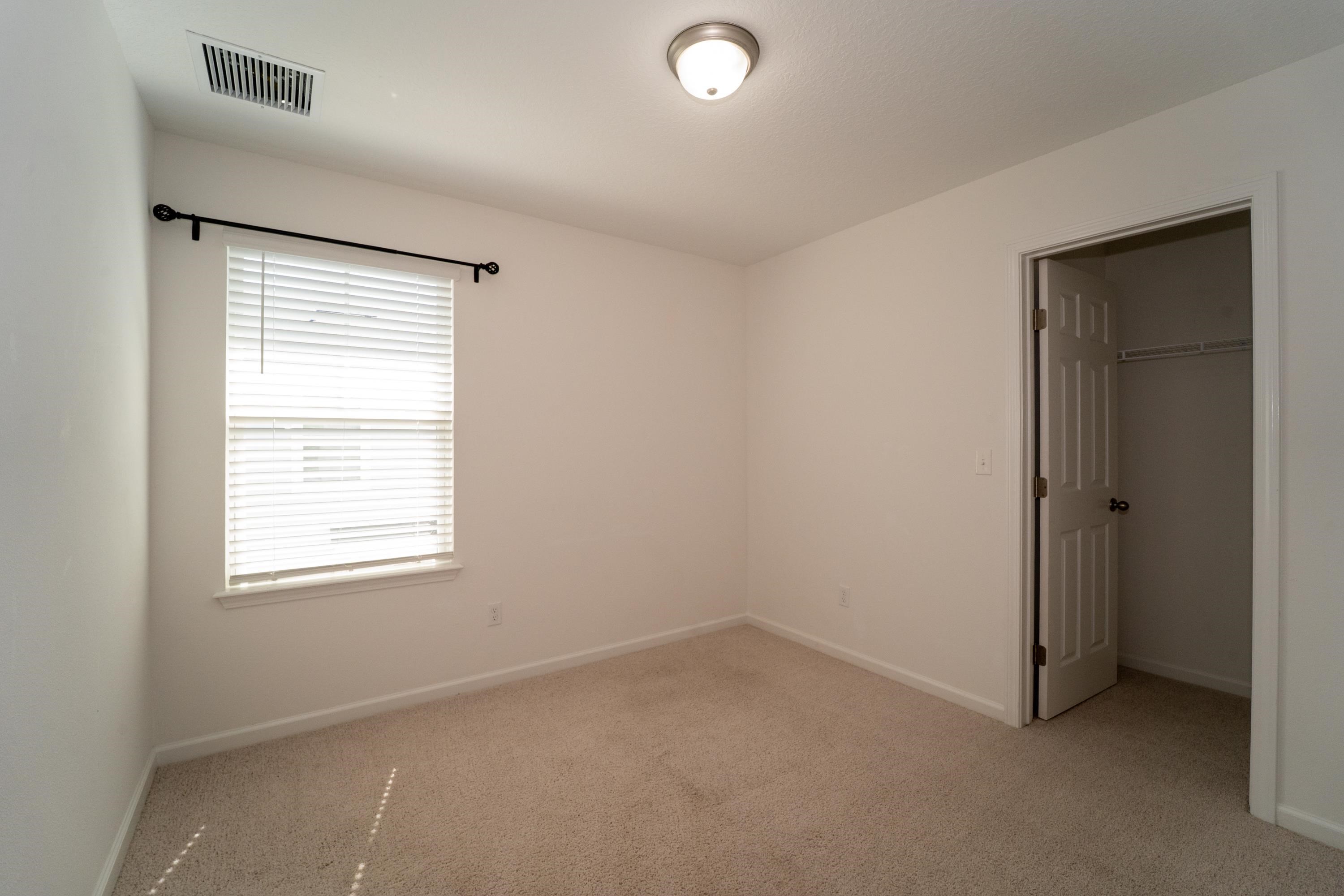 81 Ridge Lake Rd Street St. Augustine, FL 32086 - Photo 20 of 41 an empty room with a window