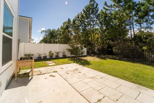 a view of swimming pool with a yard