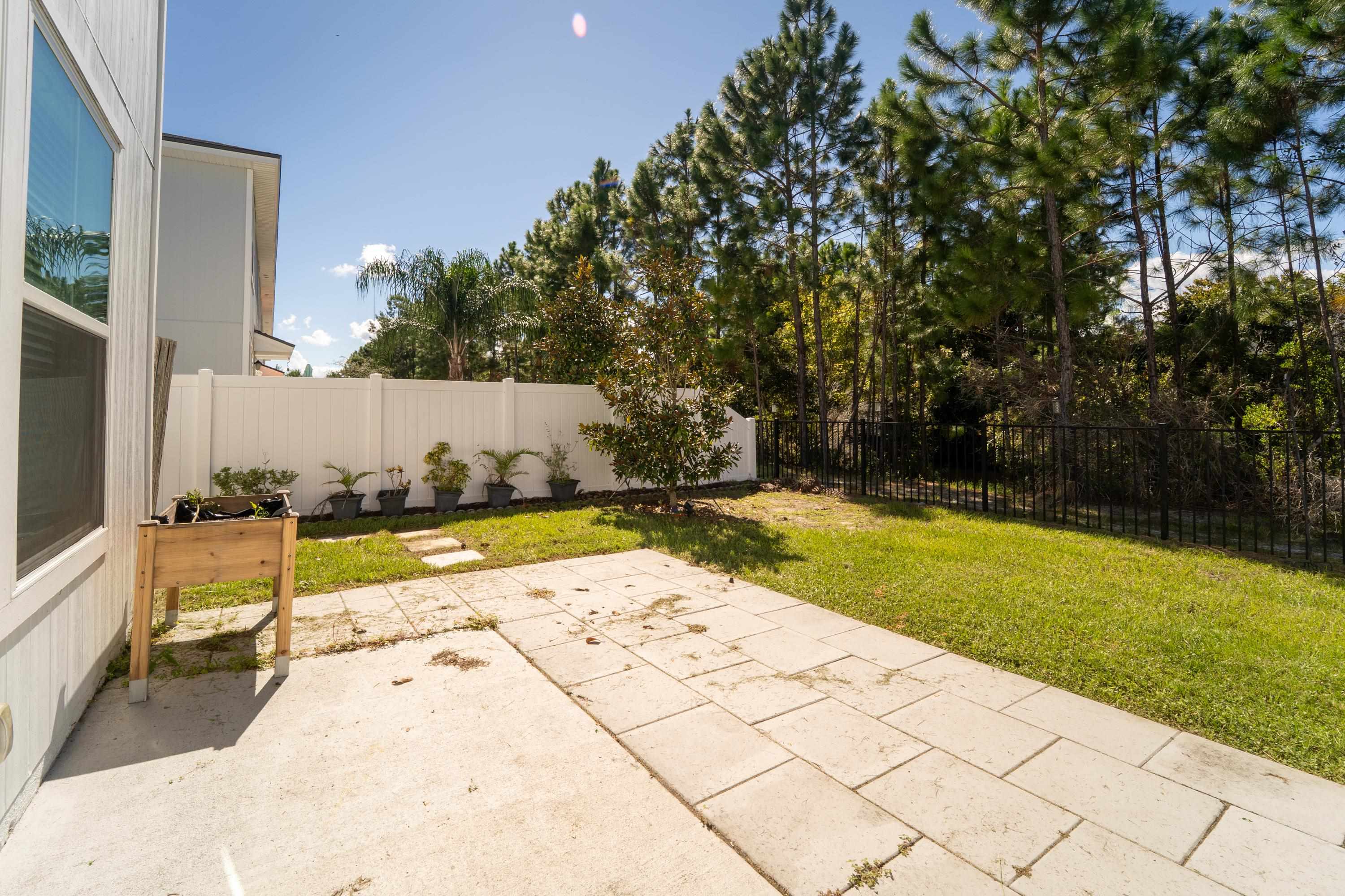 81 Ridge Lake Rd Street St. Augustine, FL 32086 - Photo 29 of 41 a view of swimming pool with a yard